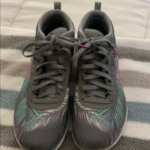 A pair of sketchers sneakers